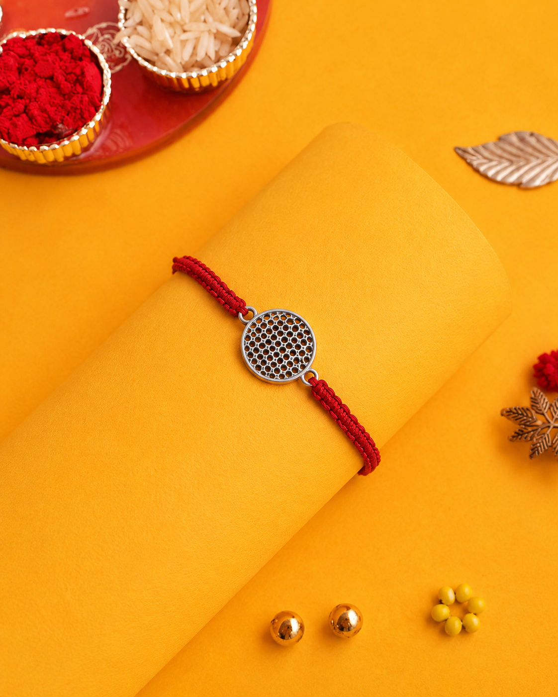 Silver lattice disc red thread rakhi