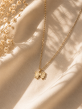 Gold-toned bow pendant necklace