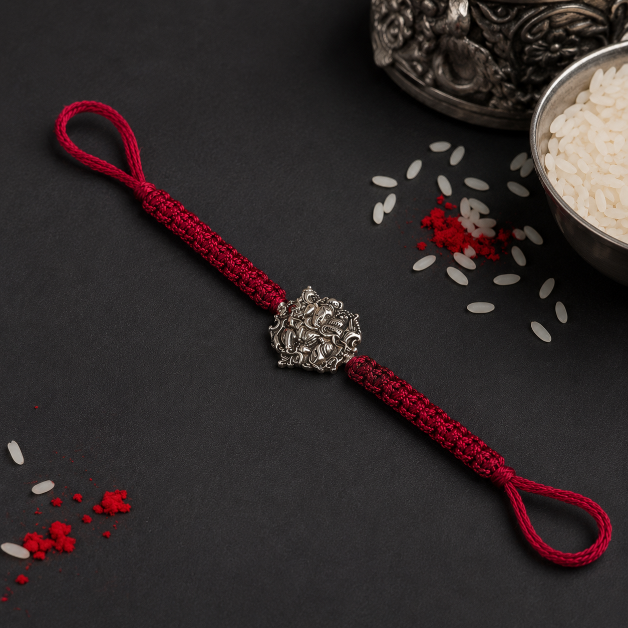 Silver Ganesha bead rakhi detail